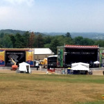 Setting up All Good – Seen here is the SL-320 (left) & SAM-550 auto stages along with flanking sound towers, video support and front of house mix