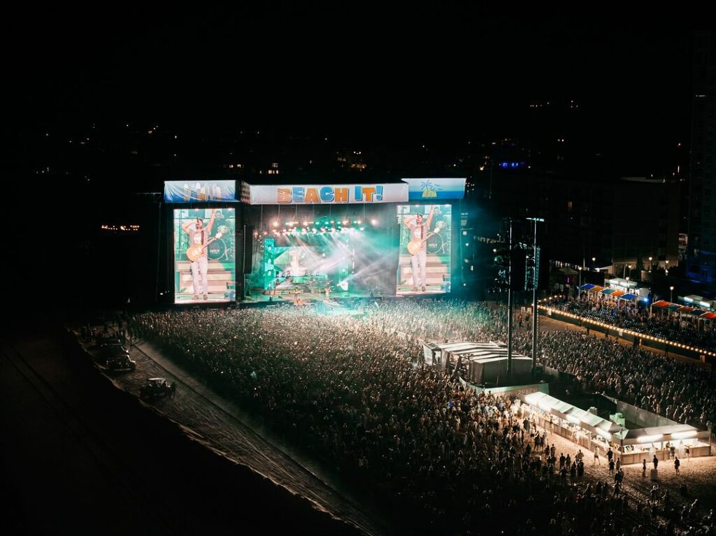 Drone shot of Luke Bryan performing at night 